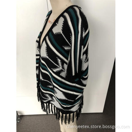 Fringe stitching a warm cardigan